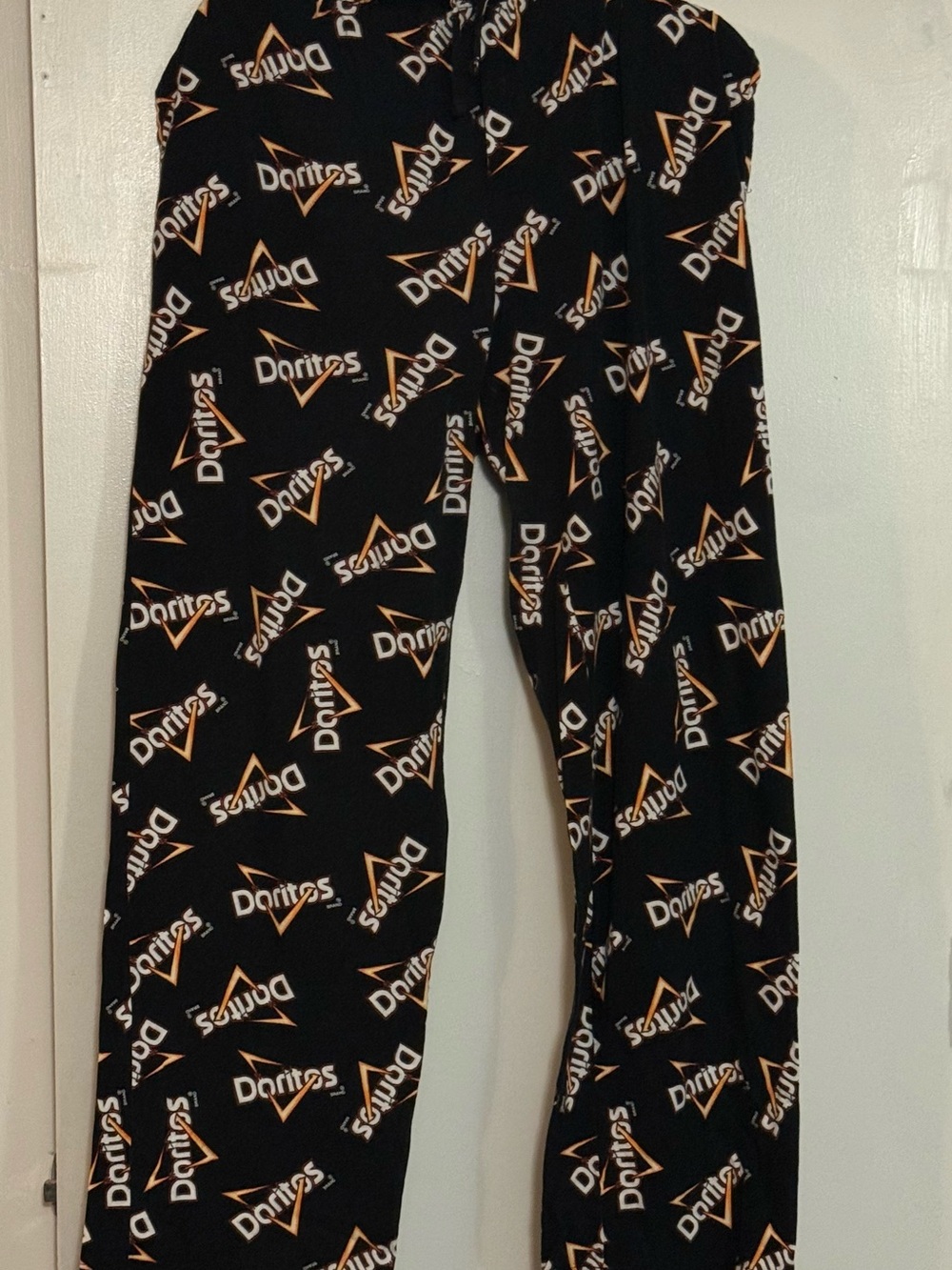 Dorito Black Lounge Pants with drawstring waistband with button.